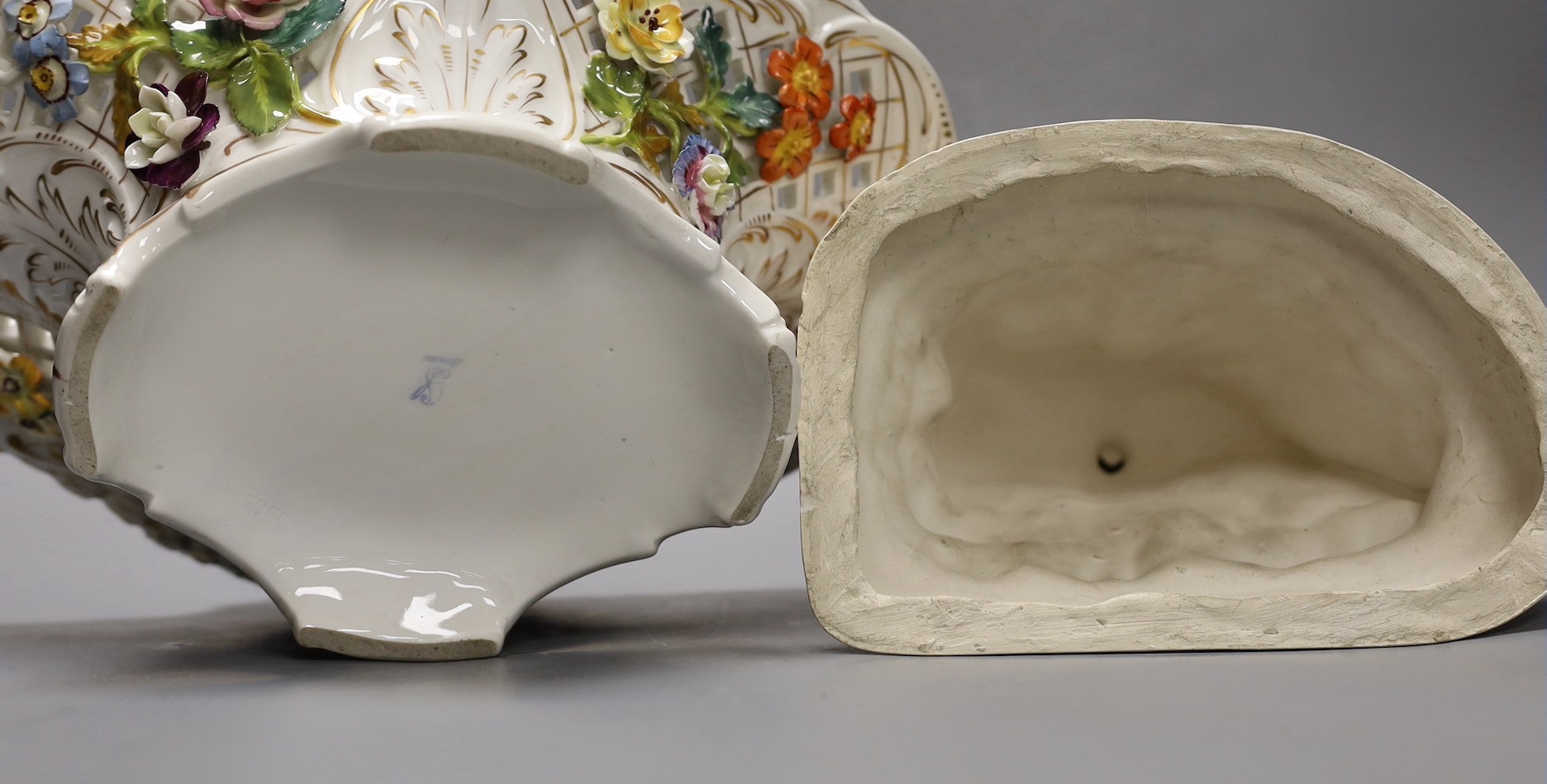 R. H. Belcher, pottery figure of a lady, 24cm and a Dresden porcelain floral encrusted basket 34cm